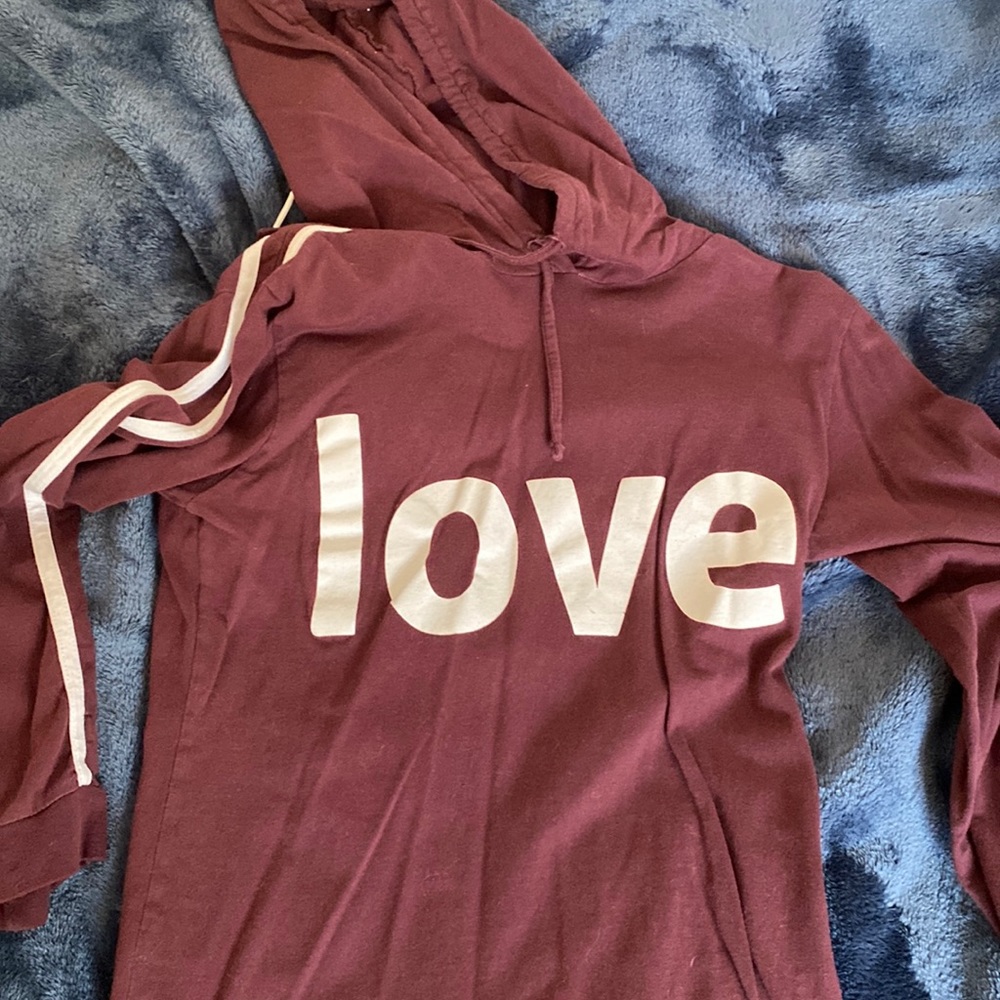 Used purple long sleeve with a hood.